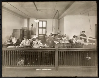 A Man and Woman Working in the Credit Office of the Mantle Lamp Co. of America, New York, 1915-16
